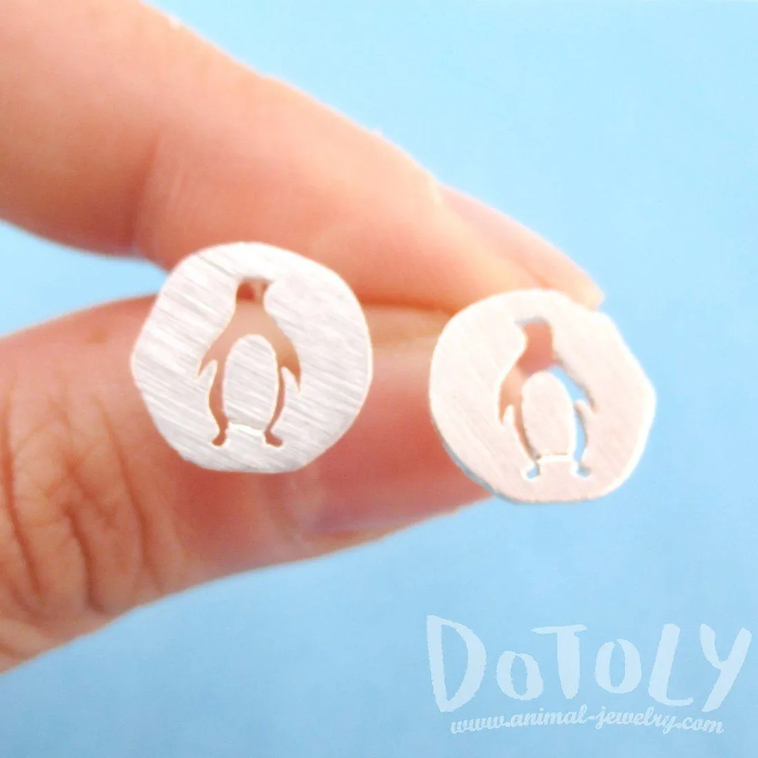 Round Silver Stud Earrings with Penguin Silhouette Cut Out in Silver | Allergy Free